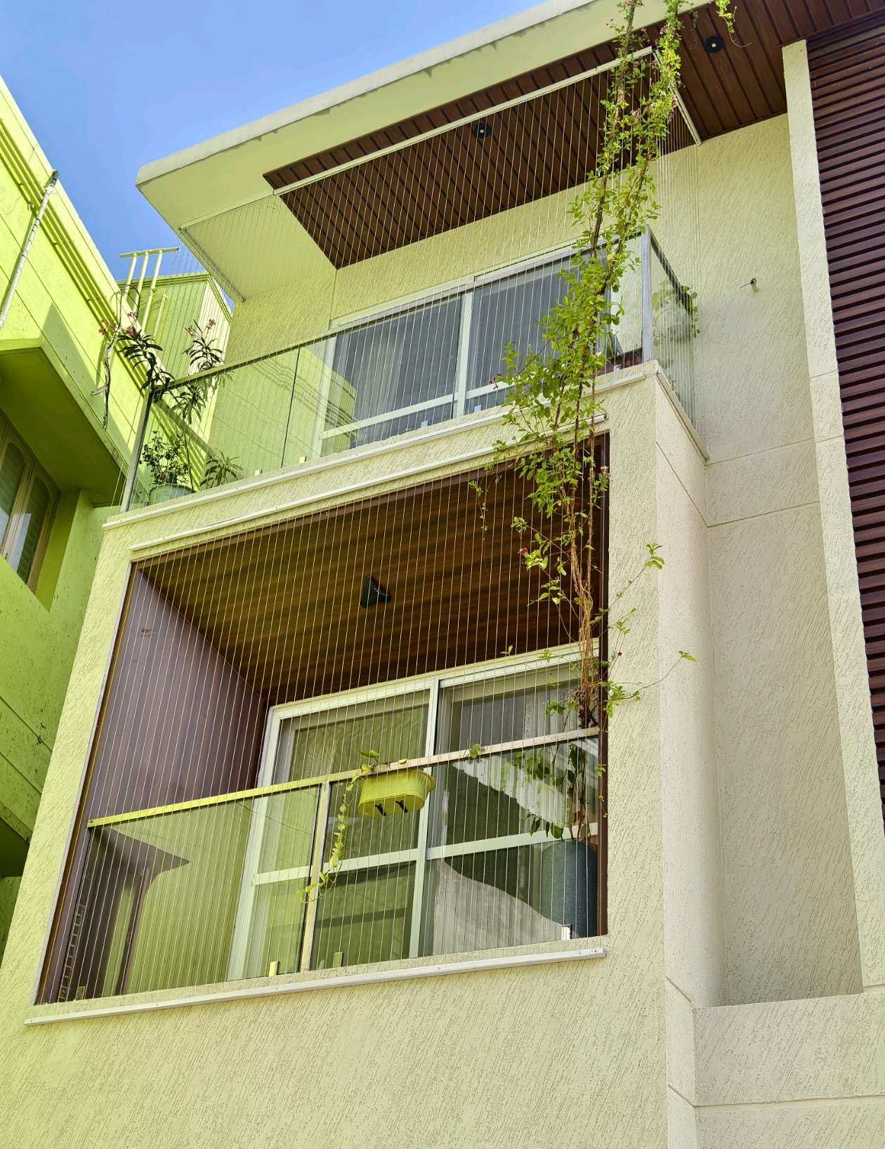 House facade with balcony railing and grill cables — real YPL work shown for Chitlapakkam customers