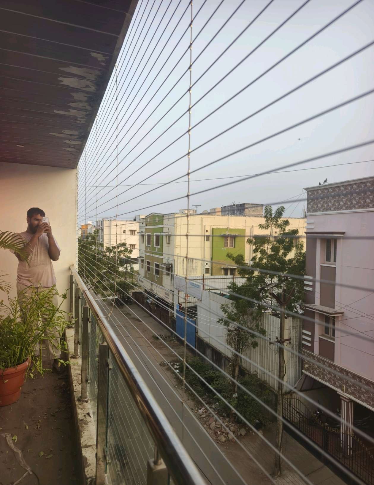 Long balcony with horizontal stainless steel cables — Kovur