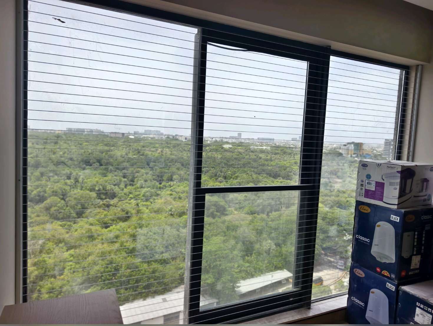 Wide window with invisible grill cables — Kovur