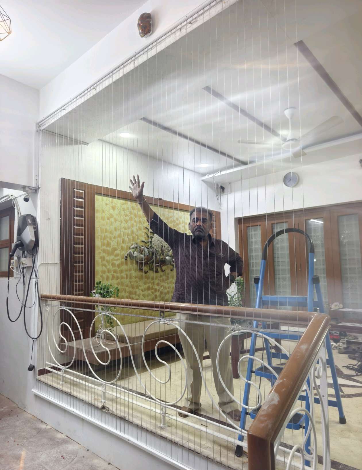 Interior stair landing with protective cable layout — real YPL work shown for Manimangalam customers