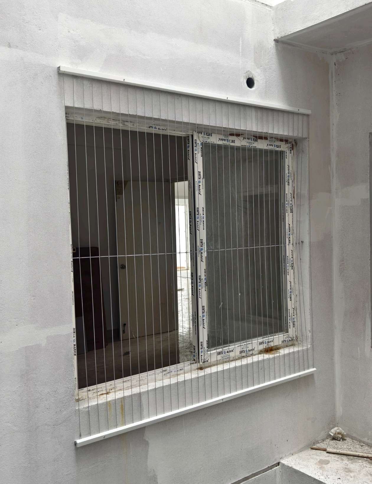 Residential window opening seen from outside — real YPL work shown for Akkarai customers