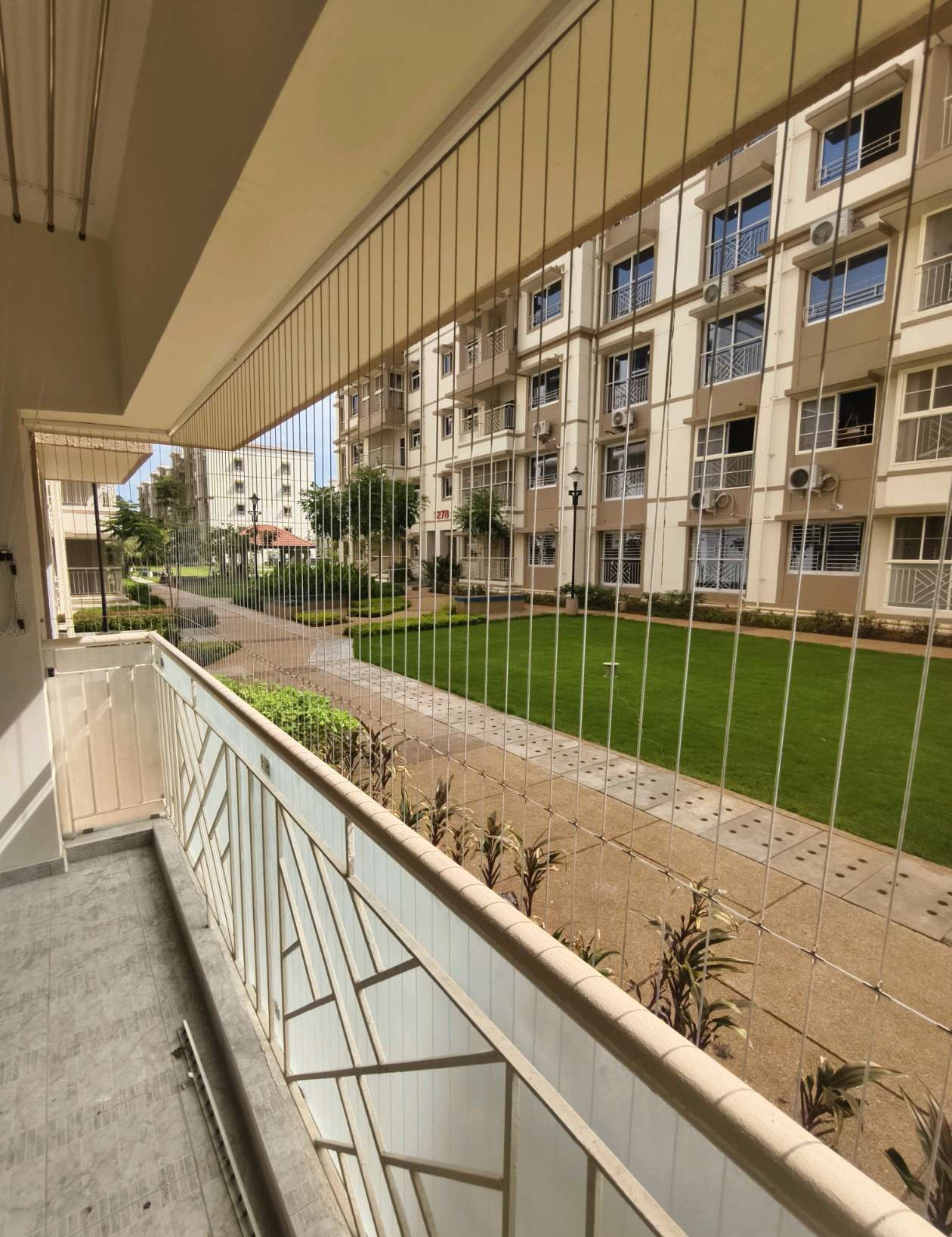 Residential balcony with cables along a glass railing — real YPL work shown for Korukkupet customers