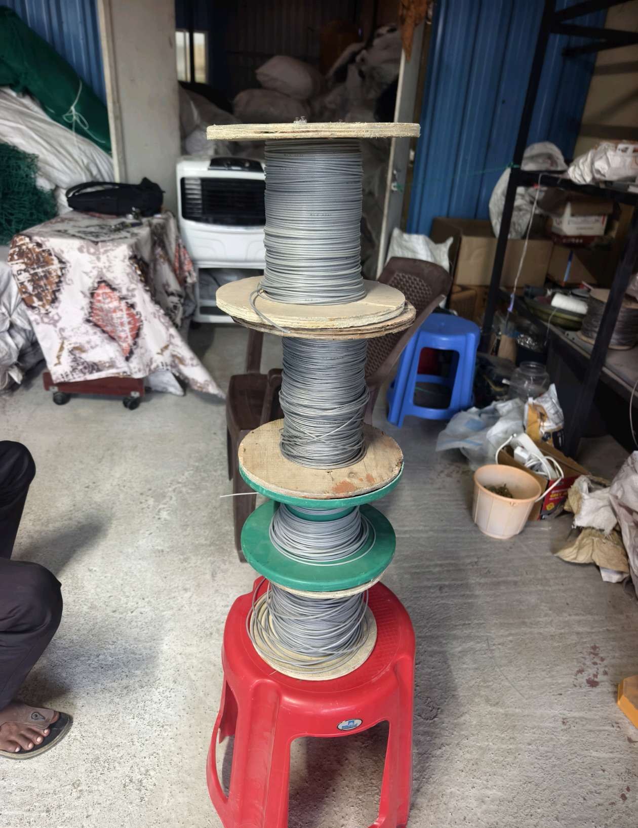 Tools and cable spool used for invisible grill installation — real YPL work shown for Manali customers