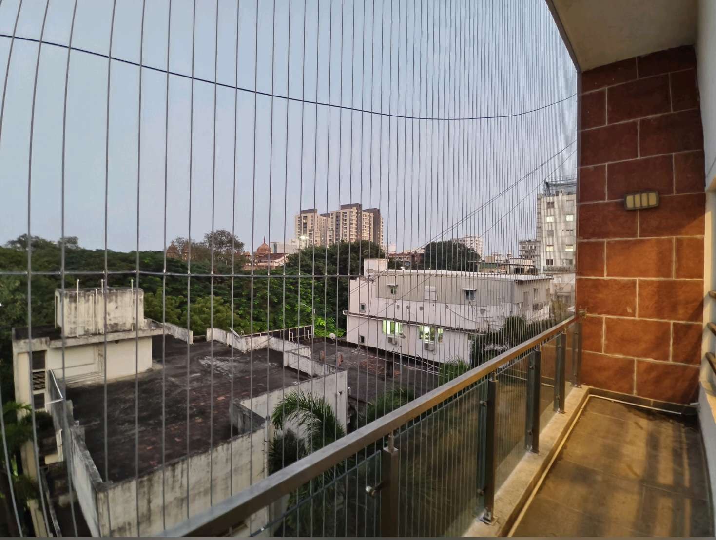 Balcony railing with fine vertical grill cables — real YPL work shown for Anna Salai customers