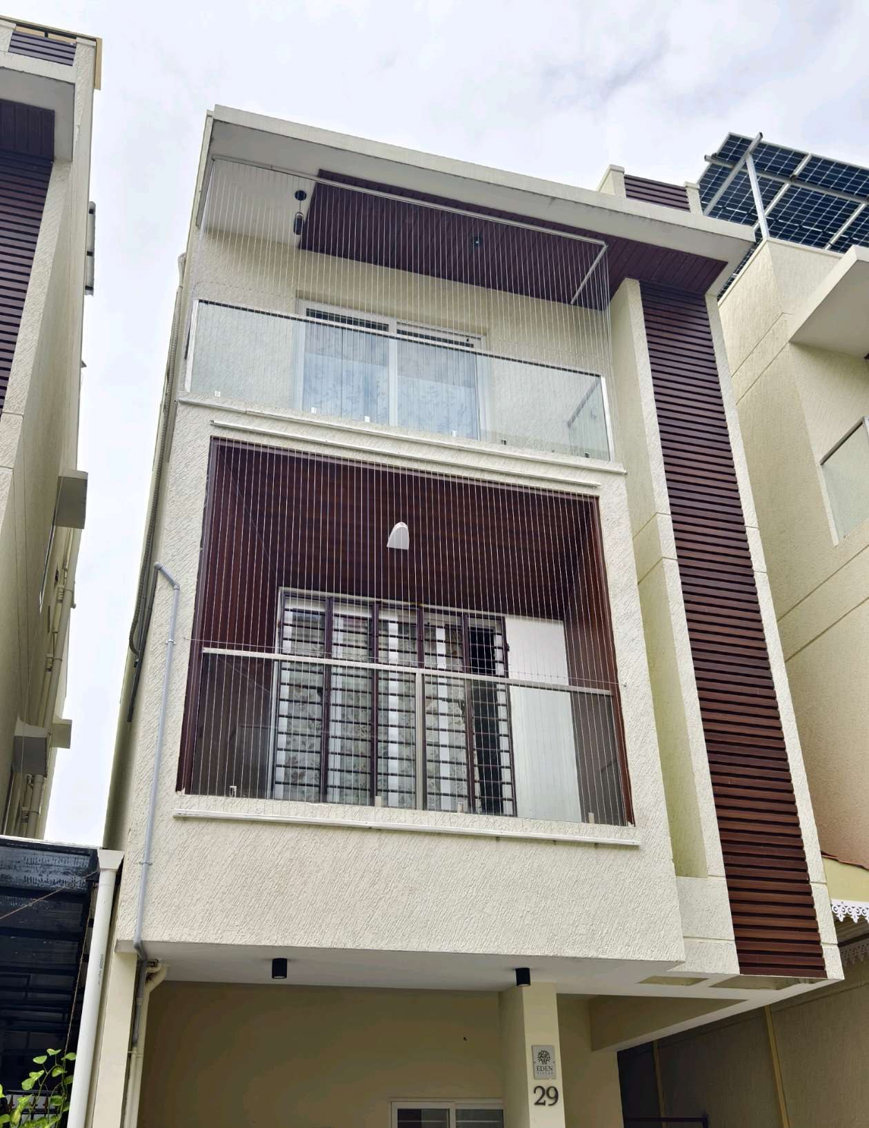 House exterior with a protected window opening — real YPL work shown for Manali customers